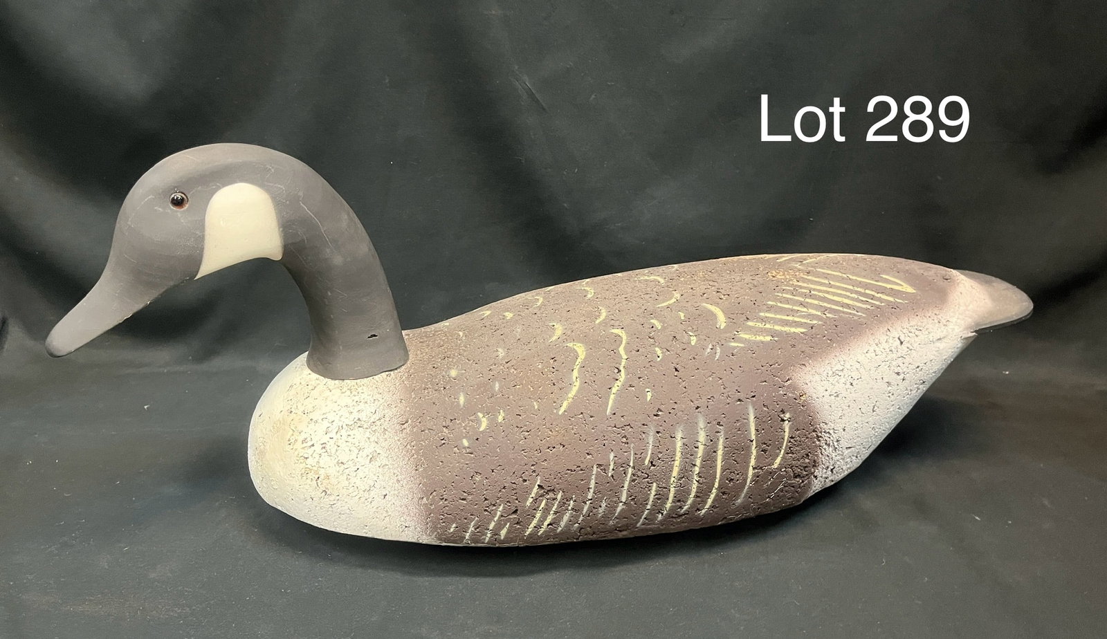 Canada Goose Cork Decoy: An early Canada Goose decoy with cork body and wooden head, glass eyes. No makers marks noted, measures 23 1/4"