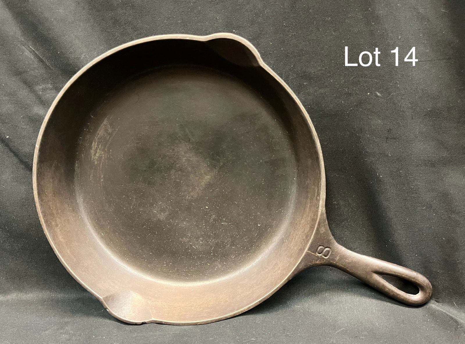 Vintage Griswold No. 8 Cast Iron Skillet: Griswold No. 8 cast iron skillet in very good condition, makers marks underneath. Measures 15 1/4" x 11 1/4"