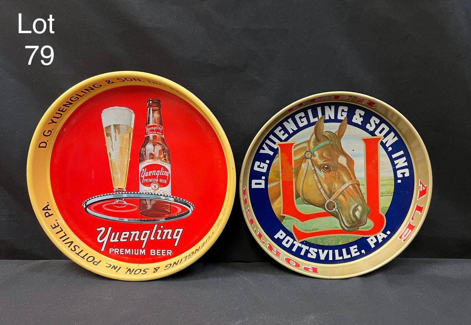 Duo of Mid Century Yuengling Beer Metal Advertising Trays: Lot of two vintage Yuengling Beer metal trays. Includes a 12" tray with horse image and a 13" red and gold tray with beer bottle and glass image. Both are marked "D.G. Yuengling & Sons, Inc. Pottsvill