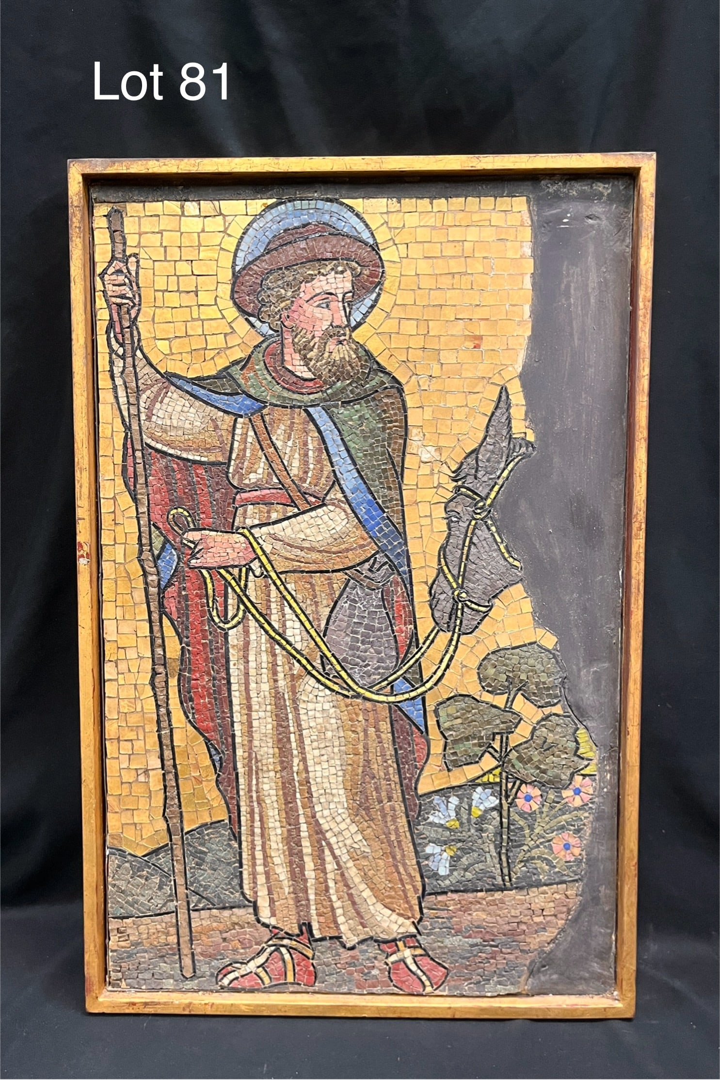 Antique Framed Religious Mosaic After Saint: A framed mosaic of a Christian figure, likely a Saint, leading a donkey and wearing a brimmed hat. Fine, detailed work especially at the face. Late 18th/early 19th c. Measures 16 1/4" x 24 3/4" in fra