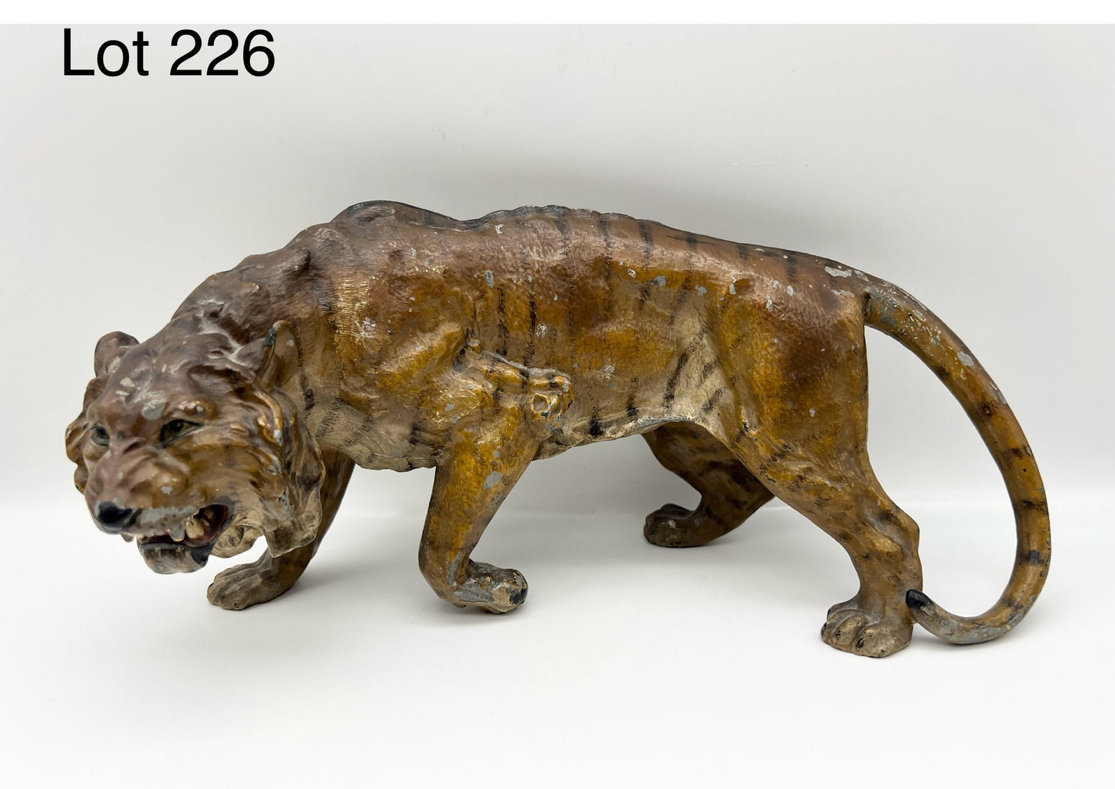Antique Cold Painted Spelter Tiger Statue: A rare early 20th century cold painted spelter statue of a tiger in mid snarl. 12 3/4" long. *notes- patina
