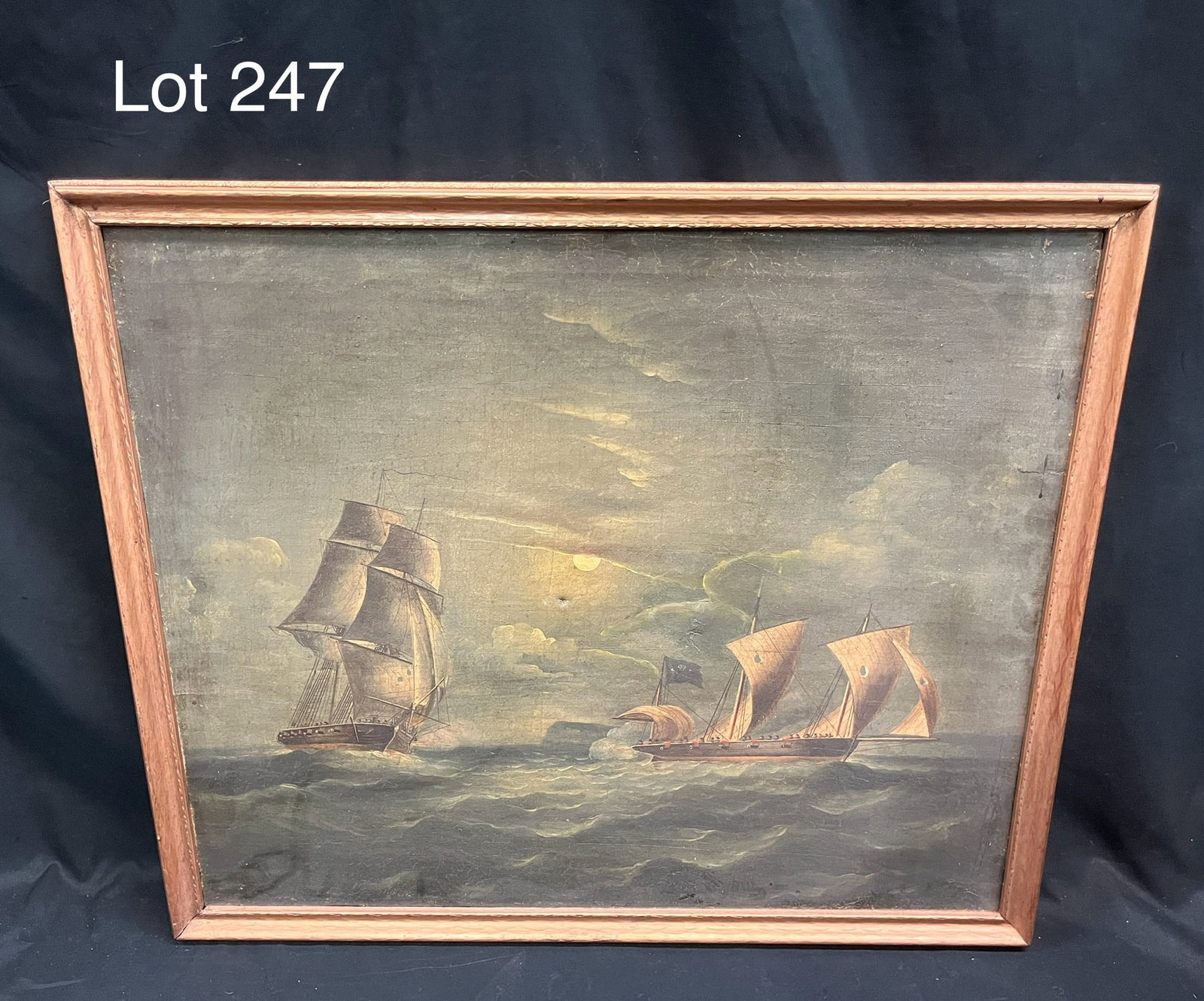 Oil on Canvas Painting of Pirate Ship Battle: An early 20th c. oil on canvas painting of two ships at sea in combat, one flying the Jolly Roger and both with torn sails. No artist's signature noted, measures 25 1/2" x 21 1/2", 23 1/4" x 19 1/4" s