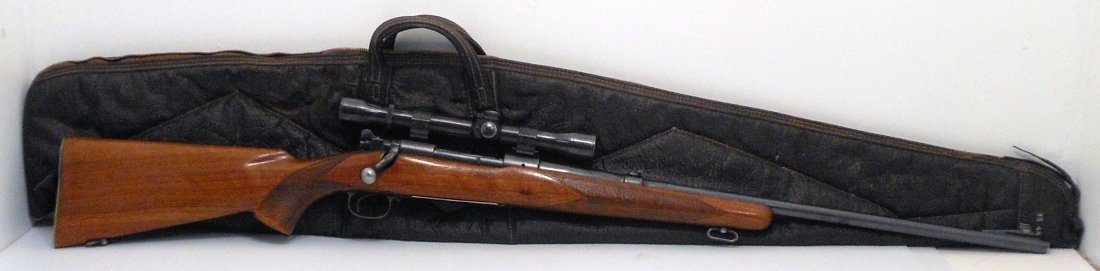 Winchester Model 70 270 Cal Rifle with Scope / Case: 44" total with a 25" barrel, Winchester Model 70 270 Cal Rifle with a Weaver K4 scope with a Weaver Pivot Mount scope mount, manufactured from 1936 to 1963. This pre-64 rifle also has a soft case. Rif