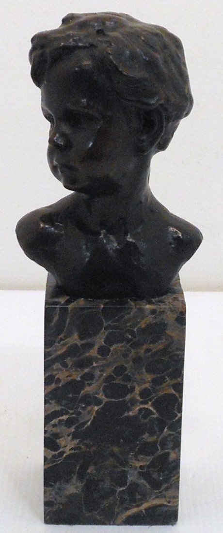 Fix-Masseau Bronze of a Young Boy: 5 1/4" bronze on a 4 3/4" marble base, Pierre Felix Masseau (1869 - 1937) was a noted French Sculptor. Signed bronze sculpture on a marble base, in excellent condition.