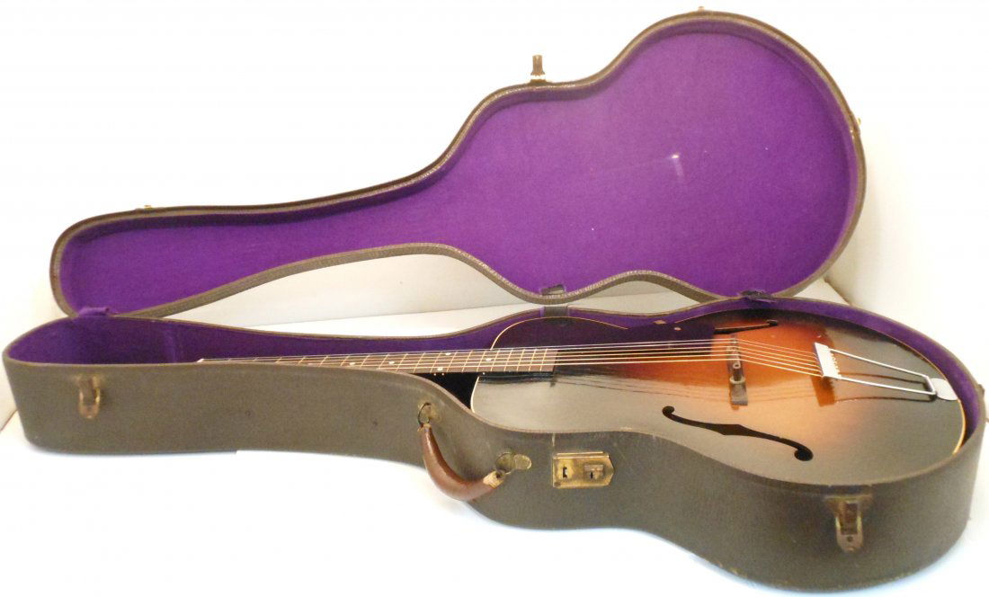 Gibson 1952 Archtop L-48 Acoustic Guitar w/ Case: 41" X 16", 1952 Gibson L-48 Archtop Acoustic Guitar. This wonderful vintage Gibson guitar has new strings, plays well and sounds excellent. Well played condition with nicks, dents, and scratches, fini