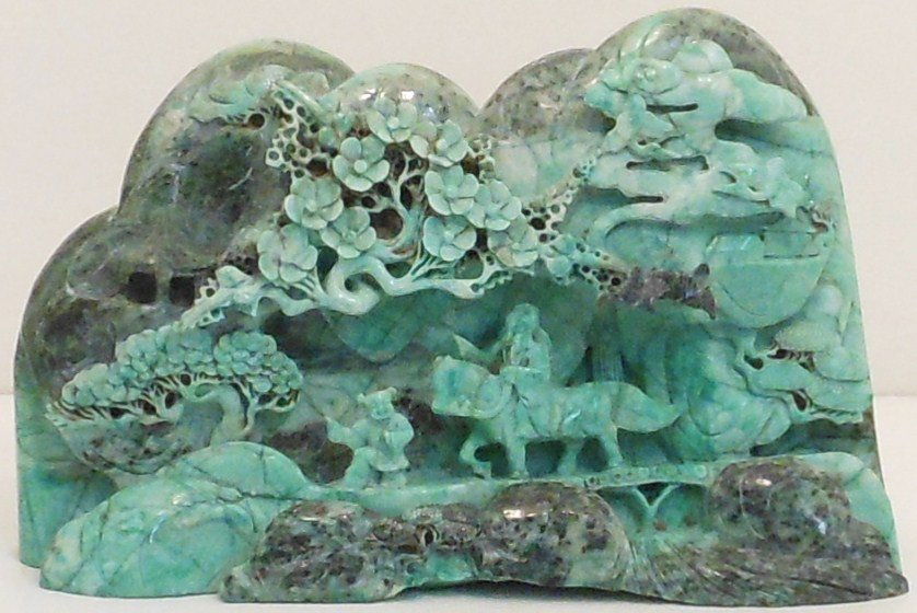 Hand Carved Jade and/or Carved Stone Landcsape Scene: 8" X 12 1/2" X 3", China, hand carved gray/green stone landscape scene with mountains, waterfall, stream, trees, flowers, child, old man on a horse crossing a bridge, unmarked, large and heavy carved