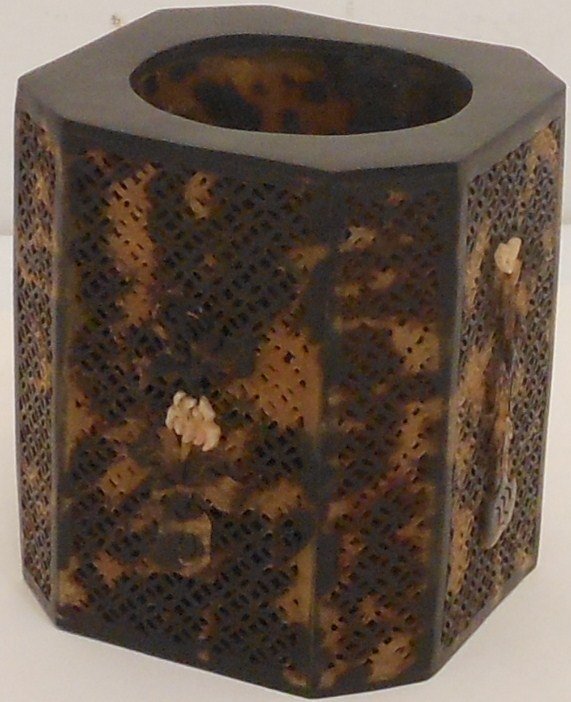 Tortoise Shell Pen Holder: 3 5/8" tall X 3 1/4" wide, China, octagonal shaped Tortoise Shell pen holder, panels have open basket weave pattern with centered vase with flowers on the four large panels, corner are solid, flower b