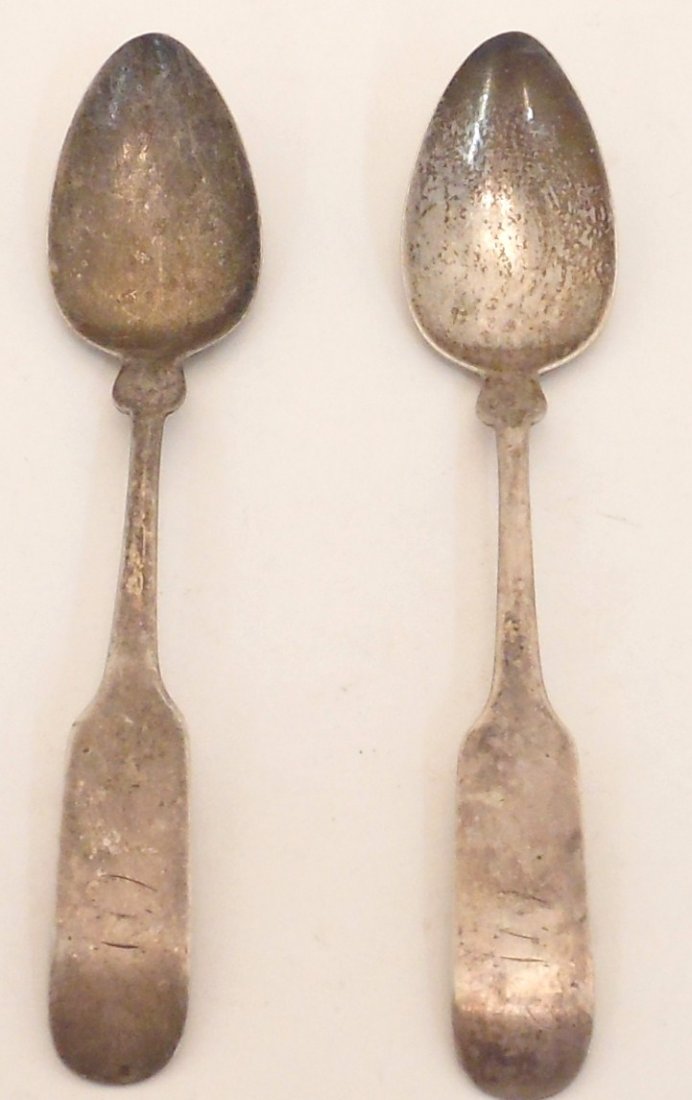 Pair of John R. Freeman Coin Silver Spoons: 5 3/4”. Two Coin Silver Spoons. John R. Freeman. Good Condition with signs of wear. 1 Troy Ozs.