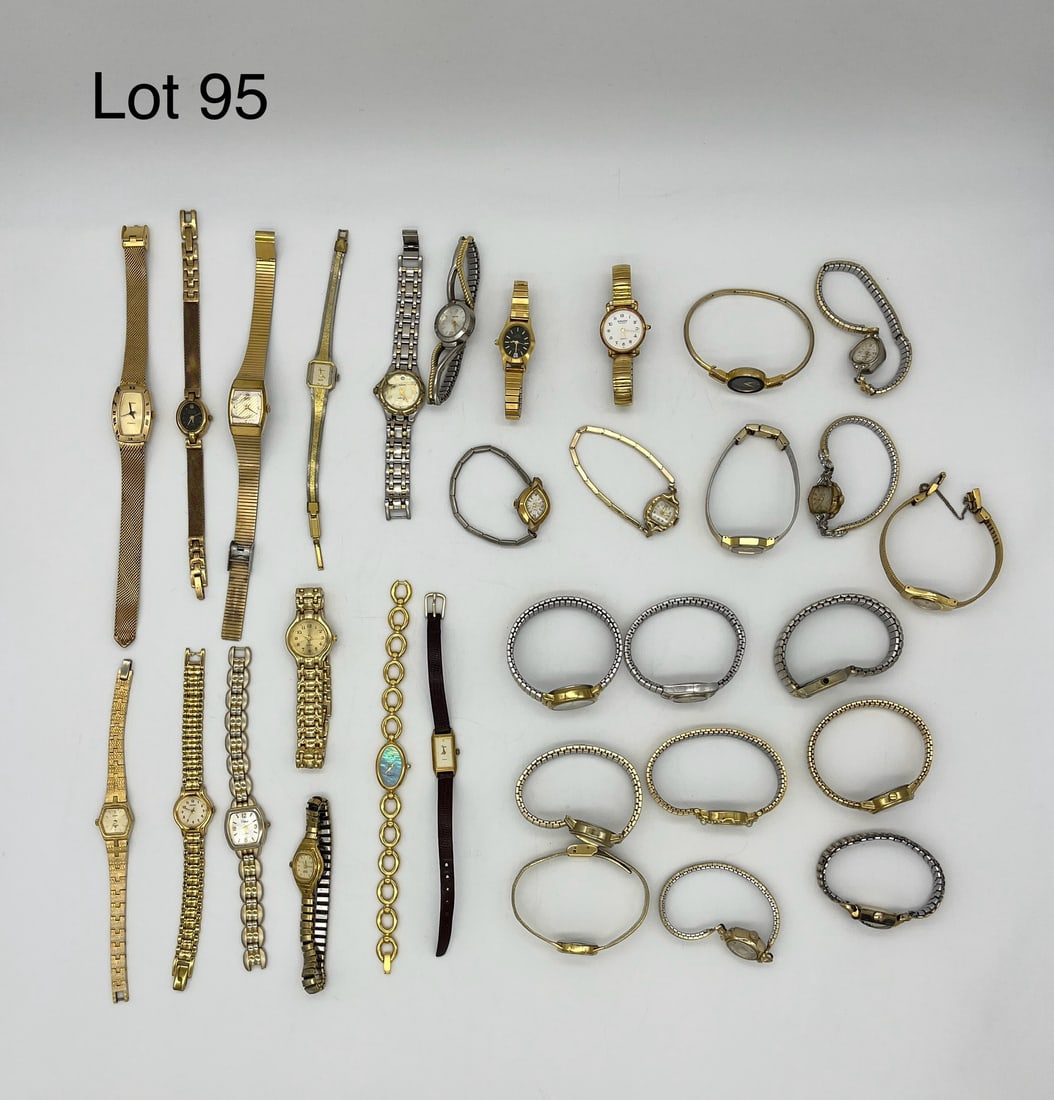 Lot of Watches in Gold Tones: Lot of 31 women's watches in gold tones. Shows makers like Citizen, Elgin, Seiko, Anne Klein, and more.