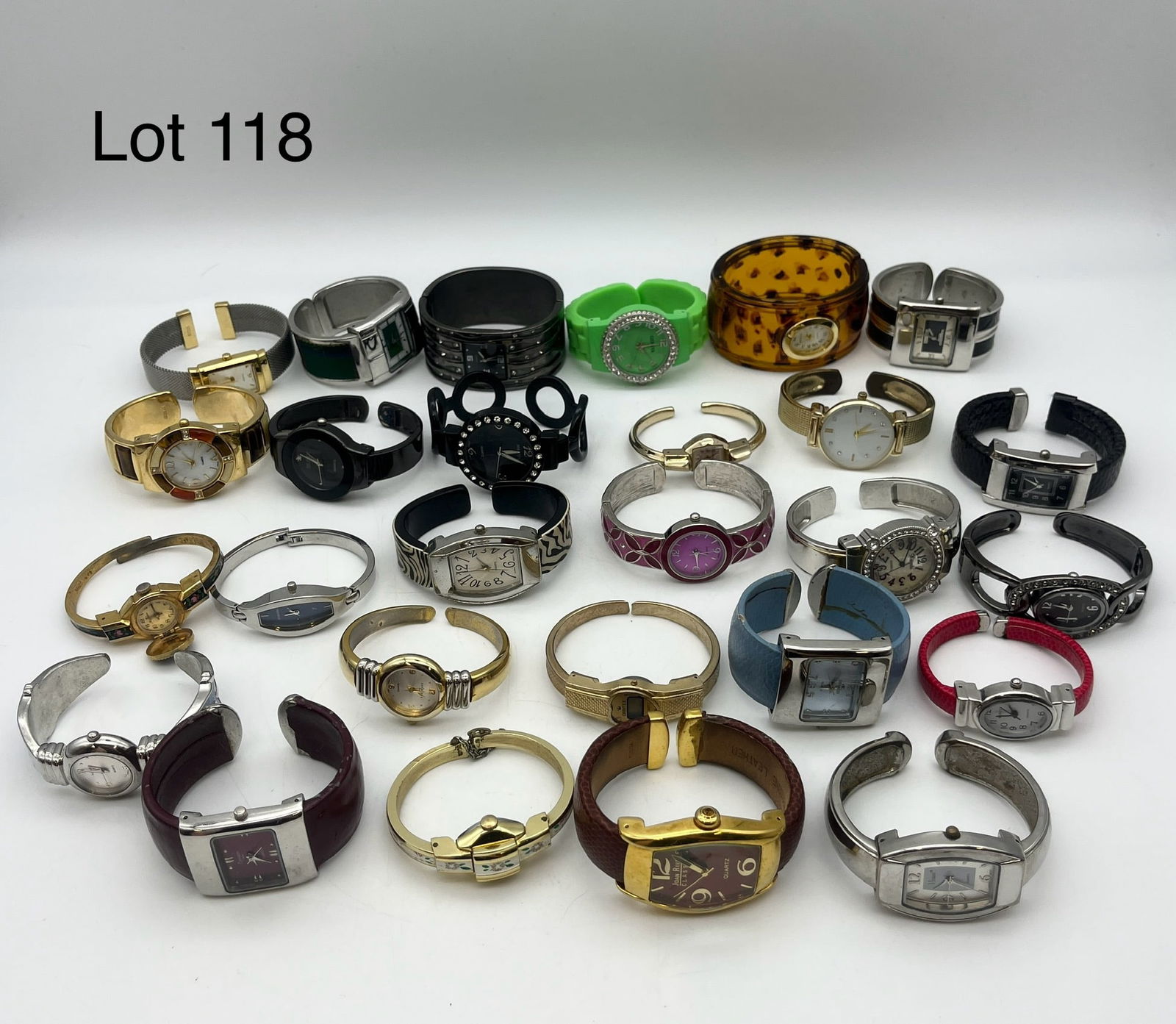 Variety of Cuff and Bangle Fashion Watches: Variety lot of women's fashion watches with a focus on cuffs and bangles. Includes makers like Xanadu, Vivani, Medana, Denacci, and more. Also shows one Towncraft 17 jewel watch in 10K gold plate.