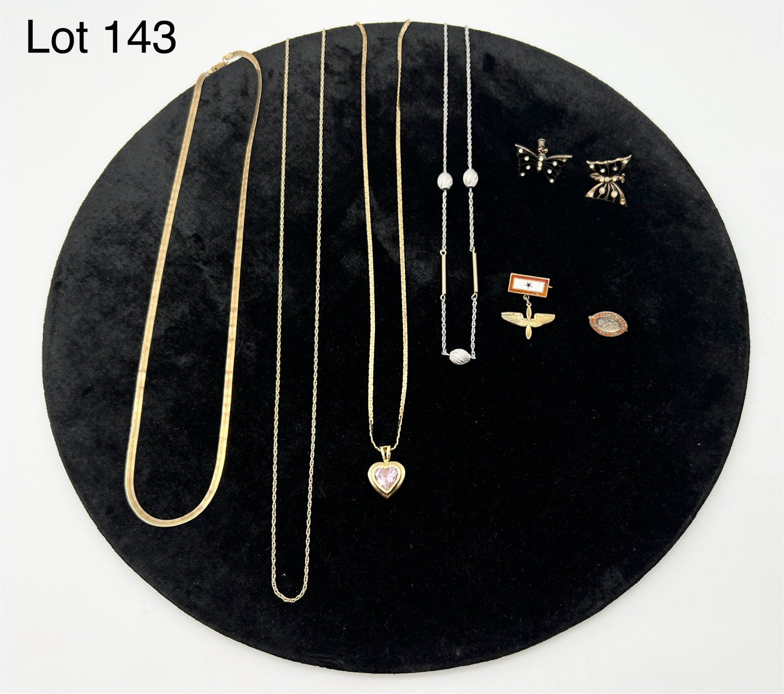 Lot of Gold Over Sterling Silver Jewelry: Lot of vermeil sterling silver jewelry. Includes a pair of screw back butterfly earrings, a pendant necklace with pink heart and more.