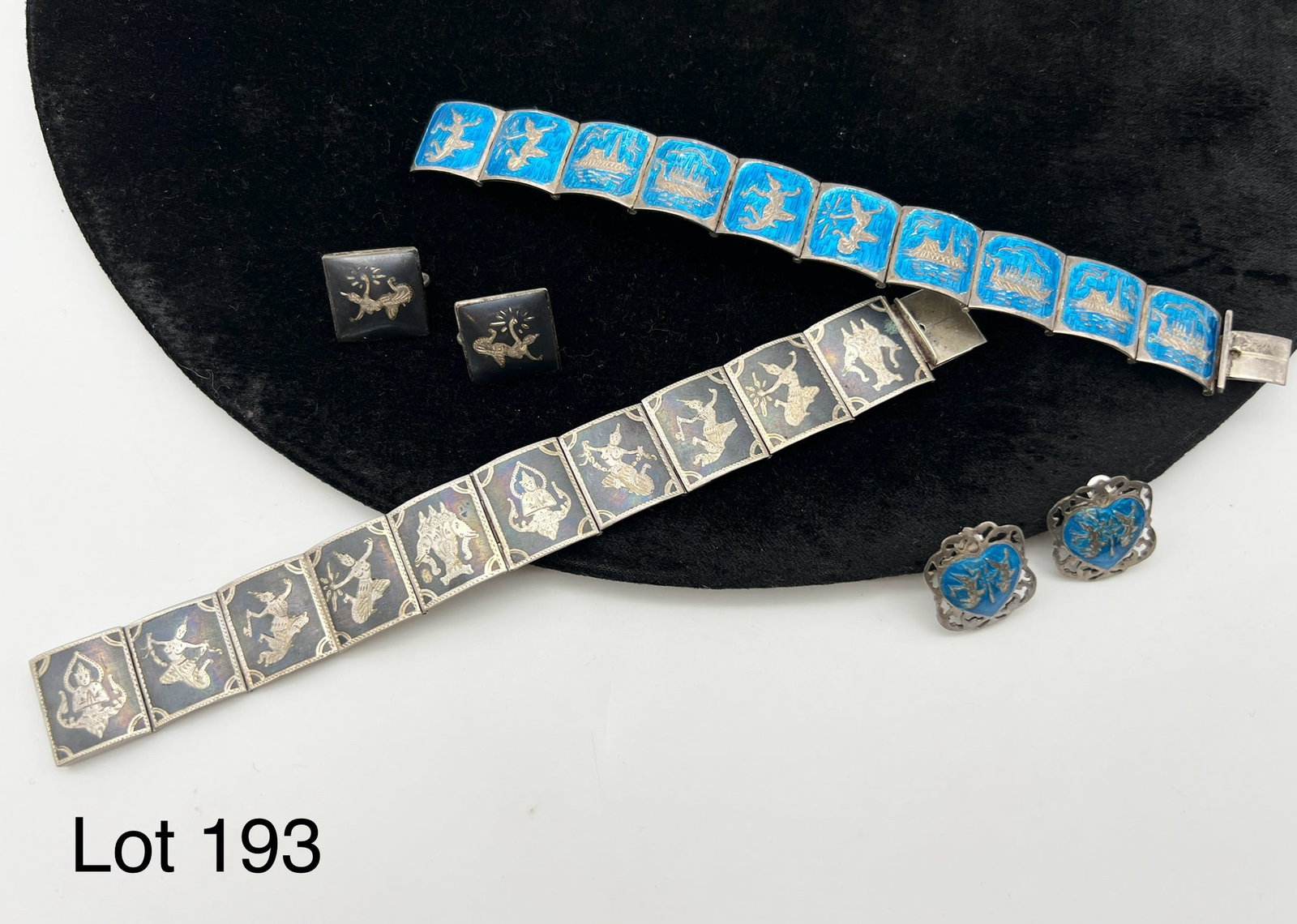 Siam Silver Bracelet and Earring Lot: Lot of Siam silver including two bracelets, both with matching earrings.