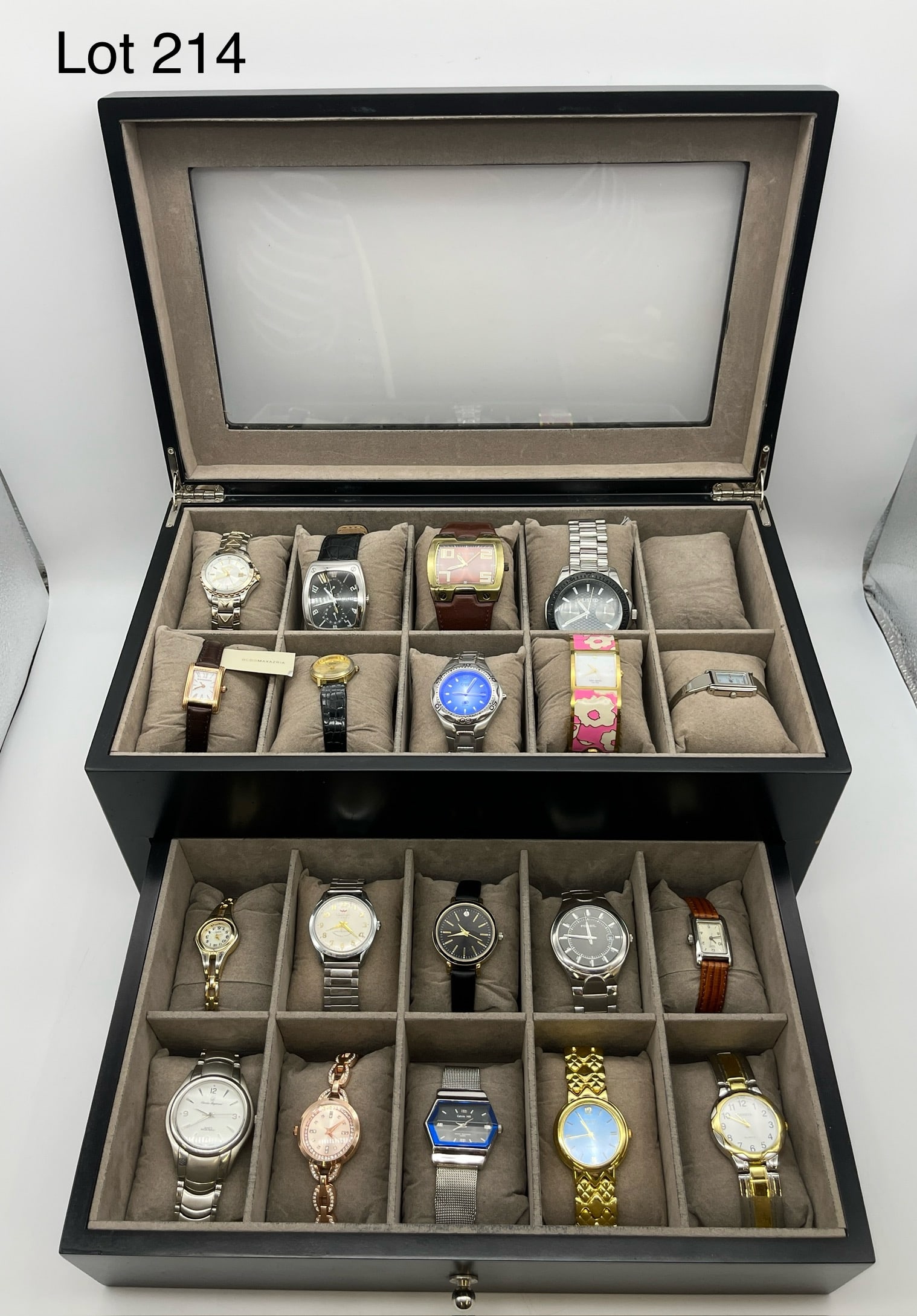 Fine Collection of Fashion Watches: A fine collection of 19 fashion watches from makers including Kenneth Cole, Fossil, Anne Klein, Unlisted, Calvin Hill, Geneva, Waltham, Charles Raymond, and more. All in working condition and provided
