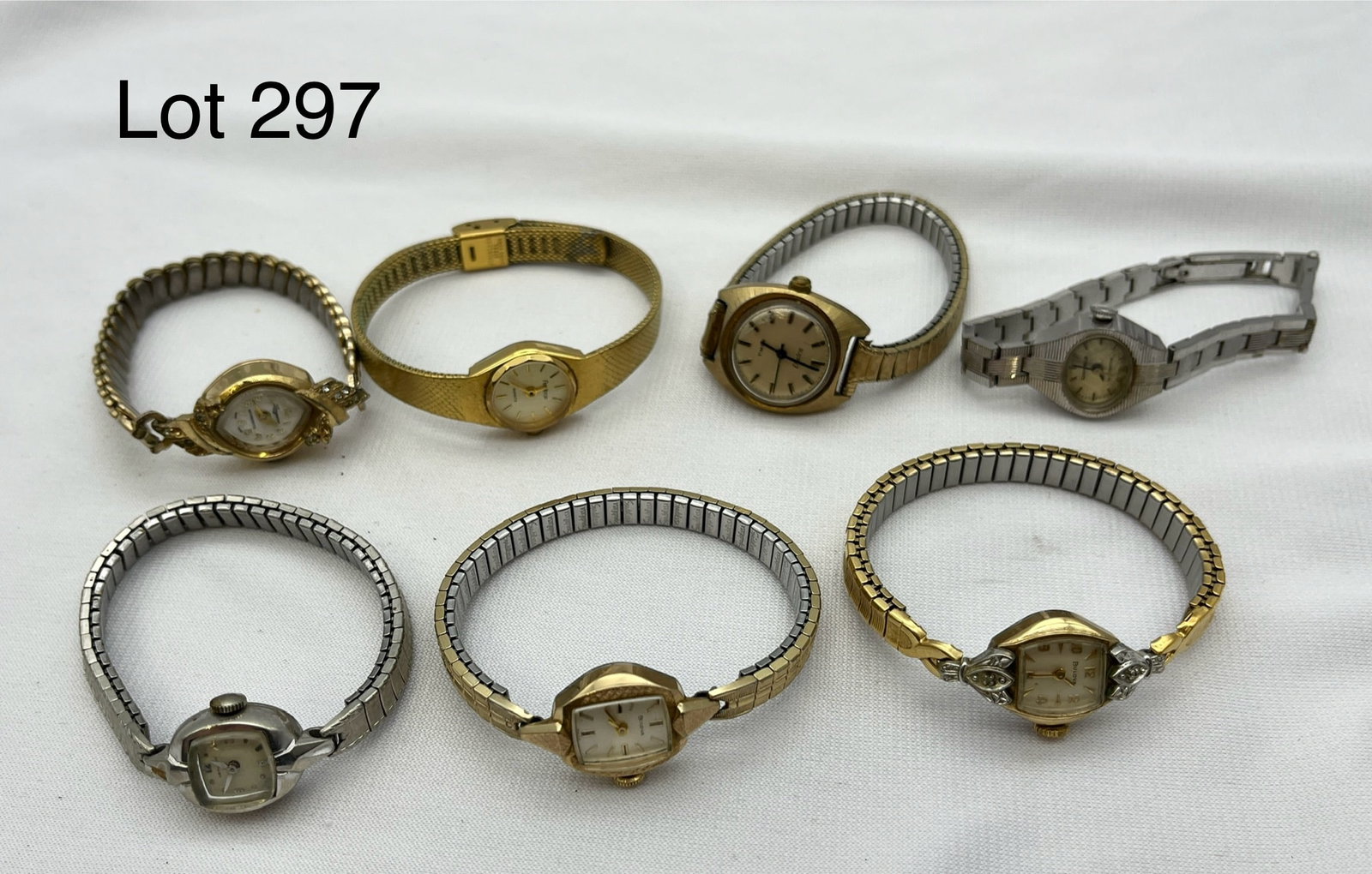 Lot of Watches with Gold Plated & Filled: Lot of seven ladies fashion watches from makers like Caravalle, Hamilton, and Bulova. Two watches noted 10K RGP, while one hamilton watch is 10K gold filled.