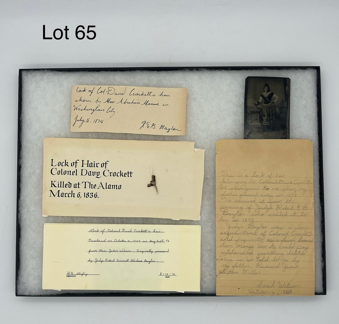 Lock of Davy Crockett's Hair: Here is a lock of hair from Colonel Davy Crockett, killed at The Alamo March 6th, 1836. Provided with additional letters and authentication which features a signature from Judge Robert Emmett Bledsoe 