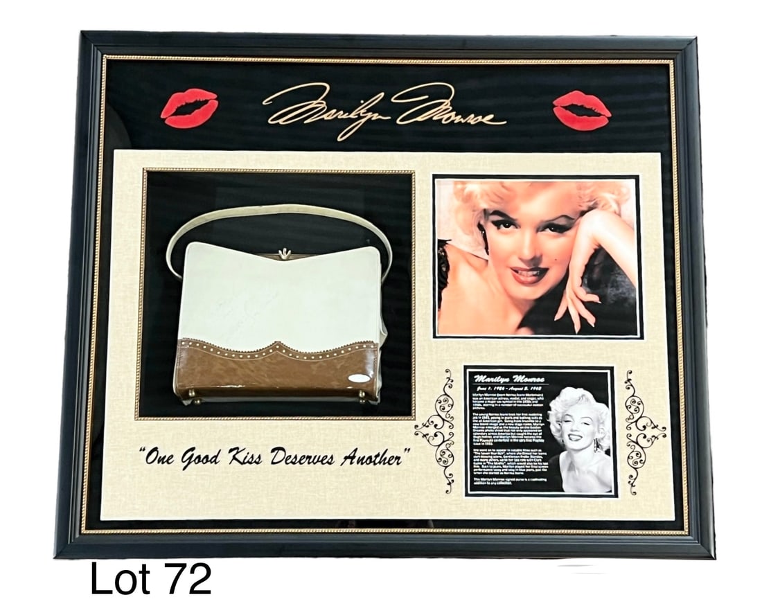 Marilyn Monroe Signed Purse With Certification: A white and brown leather purse signed by Marilyn Monroe. Presented in a showcase frame with photograph of the actress/model. Comes with certification letter from Authentic Autographs Unlimited. *note