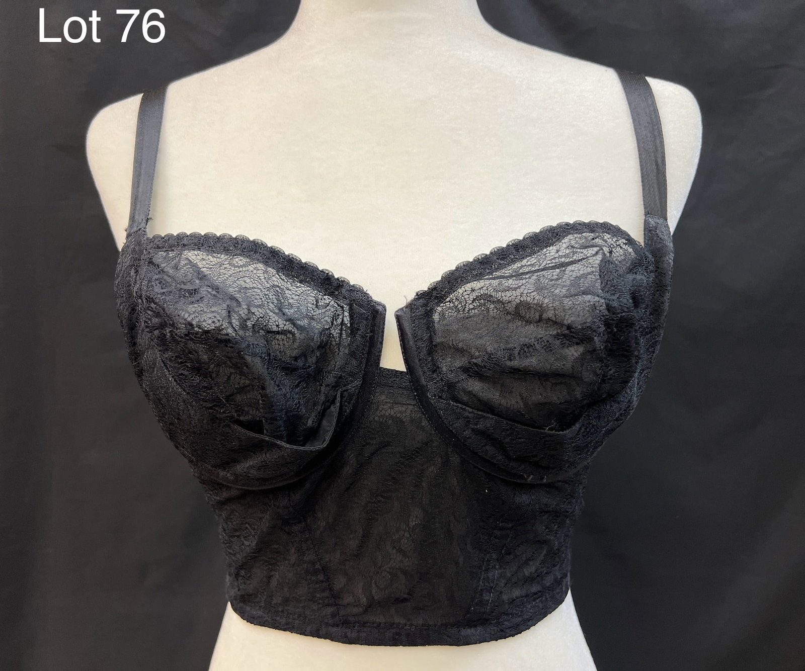 Marilyn Monroe Bustier With COA: Bustier bra owned and worn by Marilyn Monroe. This black bra is made of nylon and lace with adjustable shoulder straps and two rows of hook and eye closure on back. This stunning piece of lingerie was