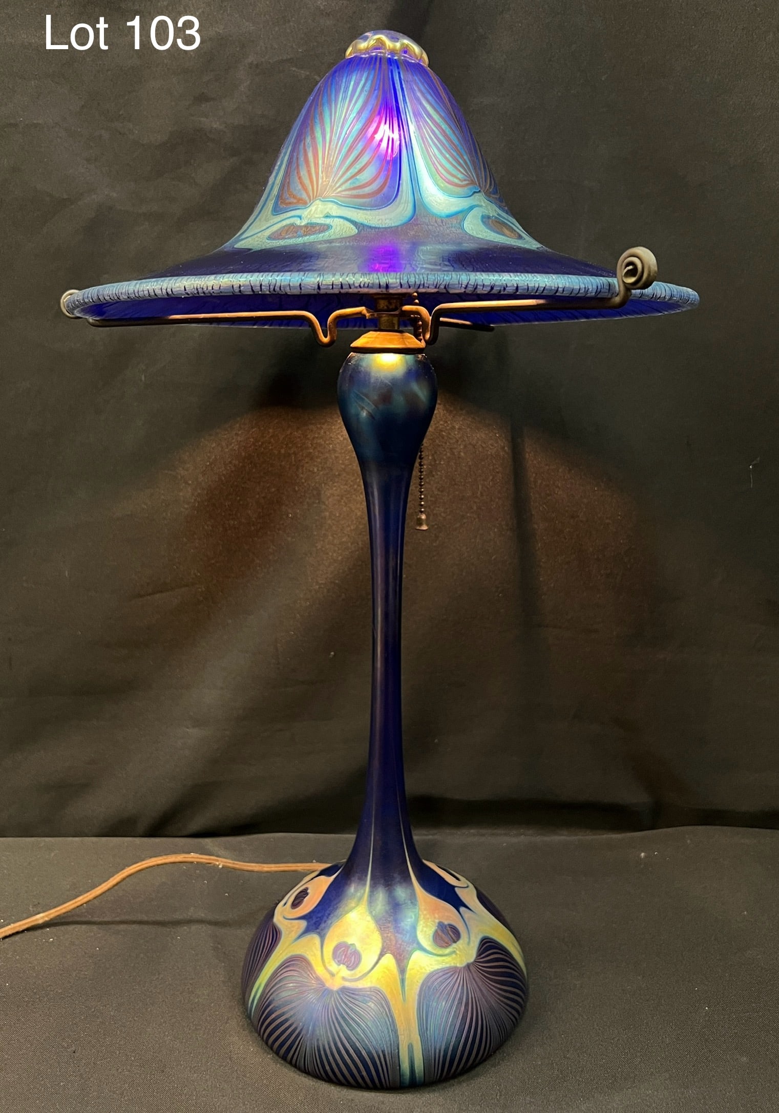 Antique Loetz Iridescent Blue Aurene Phanomen Lamp: Rare Loetz iridescent blue aurene phanomen lamp. This stunning lamp has a mushroom shaped shade, globular base and pull chain switch. In working condition. Stands 22" tall.