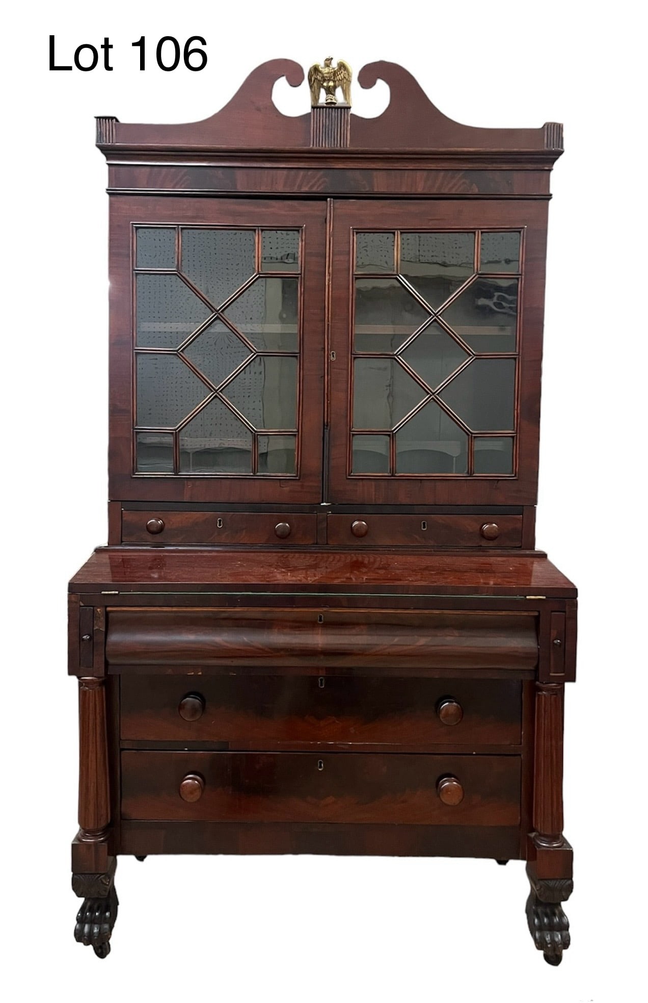 Federal Mahogany Secretary Desk Owned by Abraham Lincoln: Here is a 19th c. Federal style secretary desk once owned by President Abraham Lincoln. Beautiful make in dark mahogany wood with original glass doors. Sliders support a slanted desktop, paw feet with