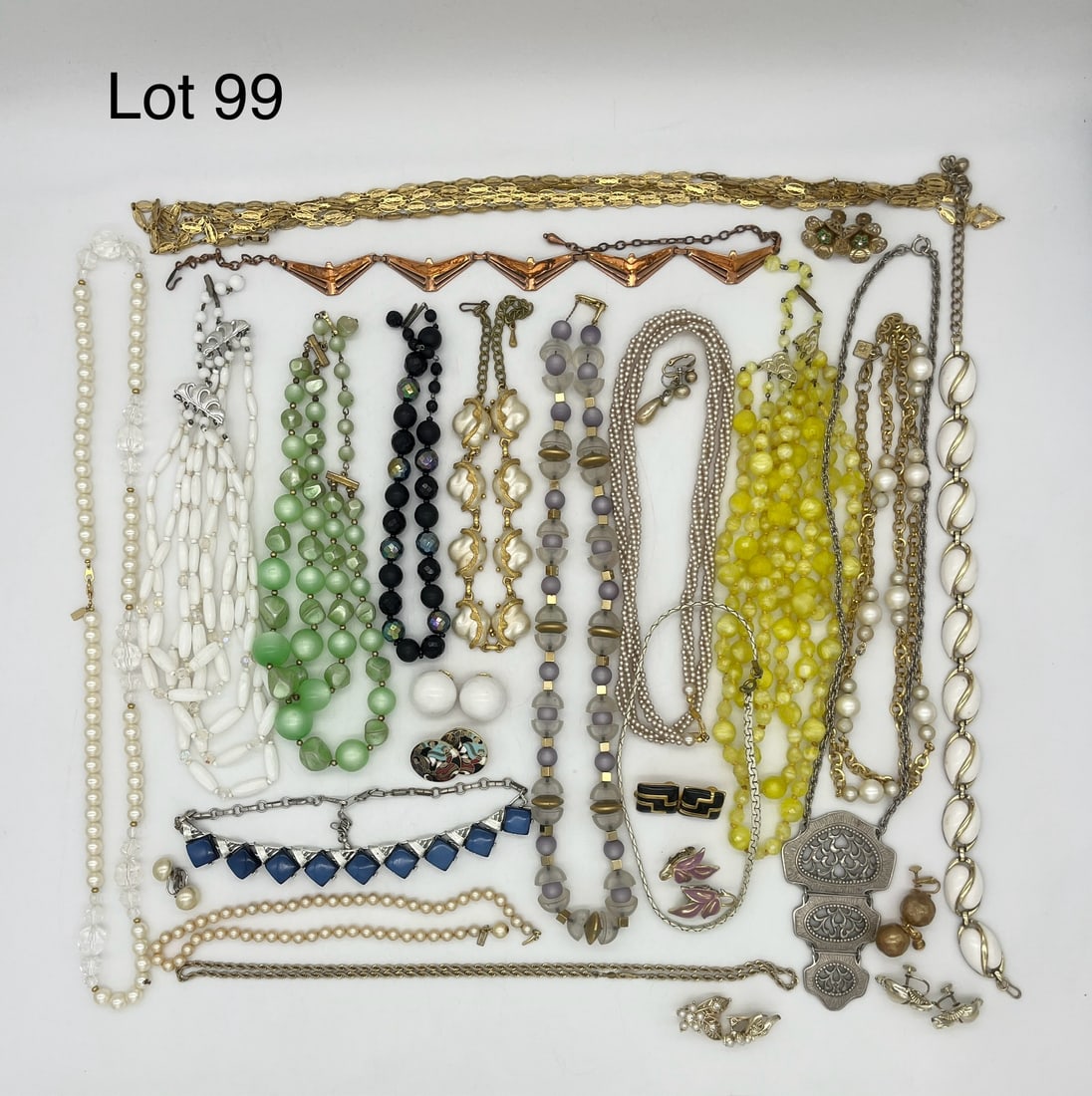 Signed Costume Jewelry Necklaces and Earrings: A nice lot of costume jewelry necklaces and earrings including designers like Coro, Emmons, Kramer, Judy Lee, and more. Also shows a 14K gold plate chain necklace.
