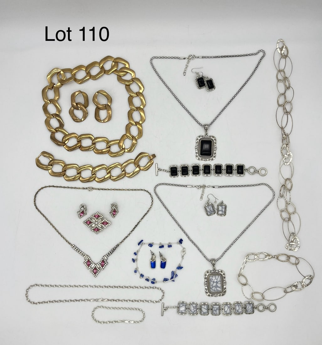 Lot of Costume Jewelry Sets: A lot of seven costume jewelry sets showing a mix of necklaces, bracelets, and earrings.