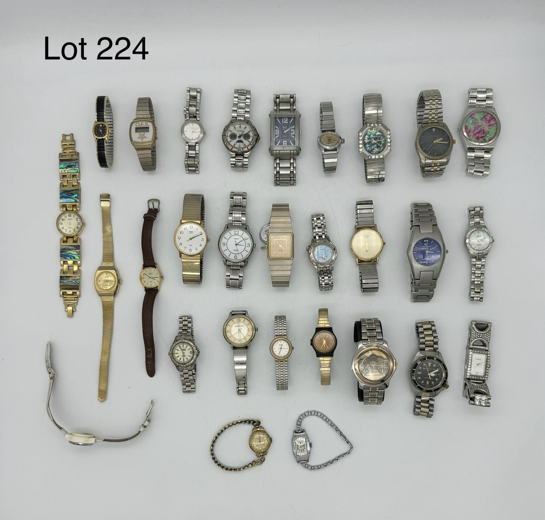 Lot of Watches: A mixed lot of twenty nine wrist watches including designers like Elgin, Seiko, Timex, Guess, and more.