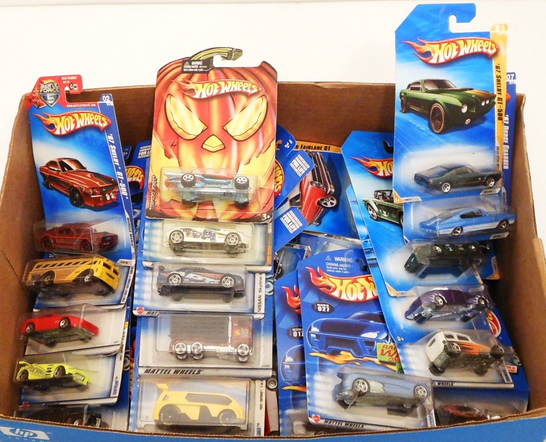 Lot of 80 Hot Wheels Blue Carded #7: Lot of 80. Hot Wheels Carded Blister Packs. May have various dates 1999-2006, mixed lot of possible First Editions, All Stars, Skin Deep, Rot Rod Magazine, 35 Anniversary, and/or more. All in like new
