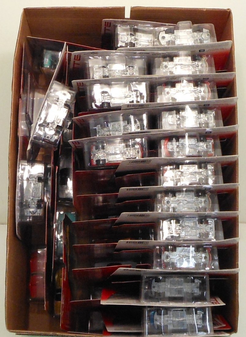 Lot of 50 Johnny Lightning 50 Years Corvette Carded #3: Lot of 50 Johnny Lightning Celebrating 50 Years of Corvette Carded Blister Packs, 2002-2003 series with multiples. All in like new condition. From a large collection, packs may have bends, dogear corn