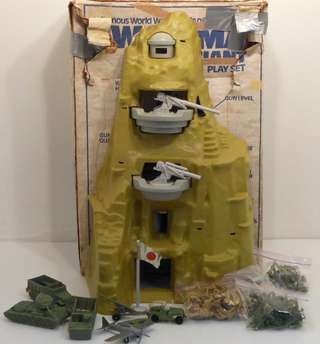 Vintage Marx Iwo Jima Giant Plat Set: World famous WWII Battle of Iwo Jima Giant Play Set by Marx, circa 1970's, 24" tall mostly complete missing bottom door, US flag and ladders, in original box that is in fair condition. Lightly played
