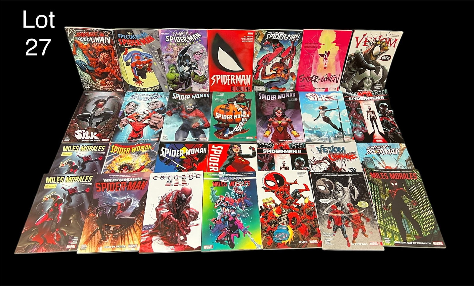 Collection of Spiderman Related Graphic Novels: A group of 28 Spiderman and related character graphic novels. Includes multiple volumes of Silk, Spider-Woman, Venom, Miles Morales and more.
