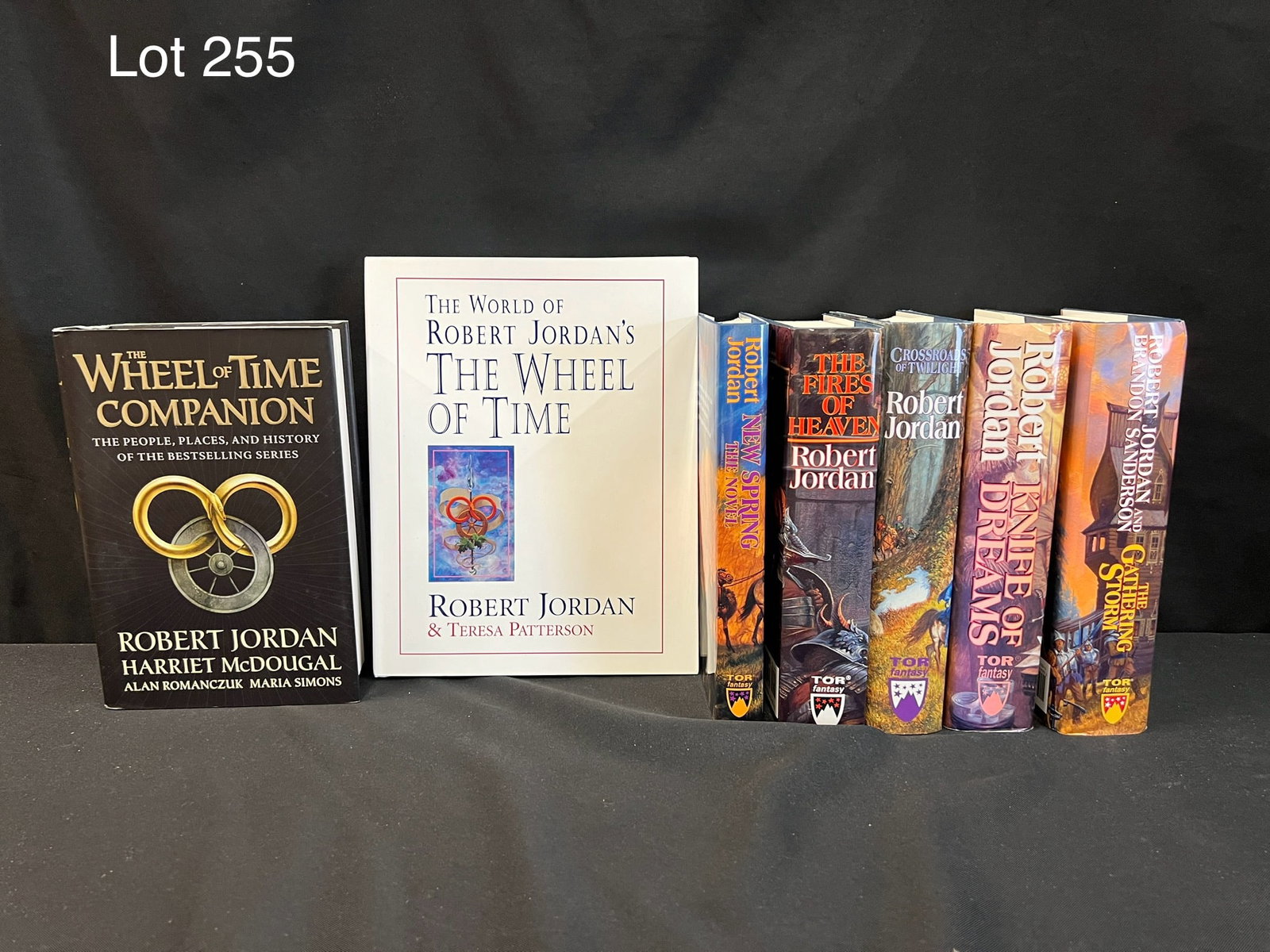 Collection of Wheel of Time Books: Lot of 7 hardcover books including 'The World of Robert Jordan's Wheel of Time', 'The Wheel of Time Companion', 'New Spring: The Novel', 'The Fires of Heaven', 'Crossroads of Twilight', 'Knife of Drea