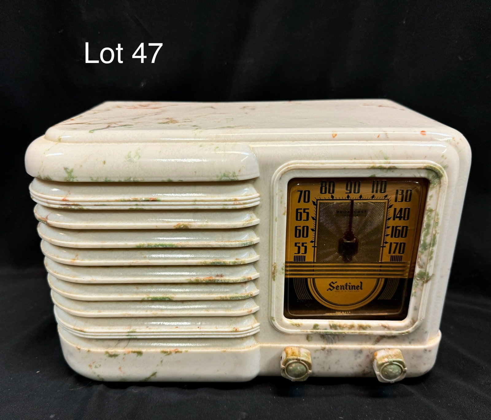 1941 Sentinel 249 Tube Table Radio: A Sentinel model 249 tube table radio. Marble plastic, squared dial with wrap-around grille, 2 knobs.