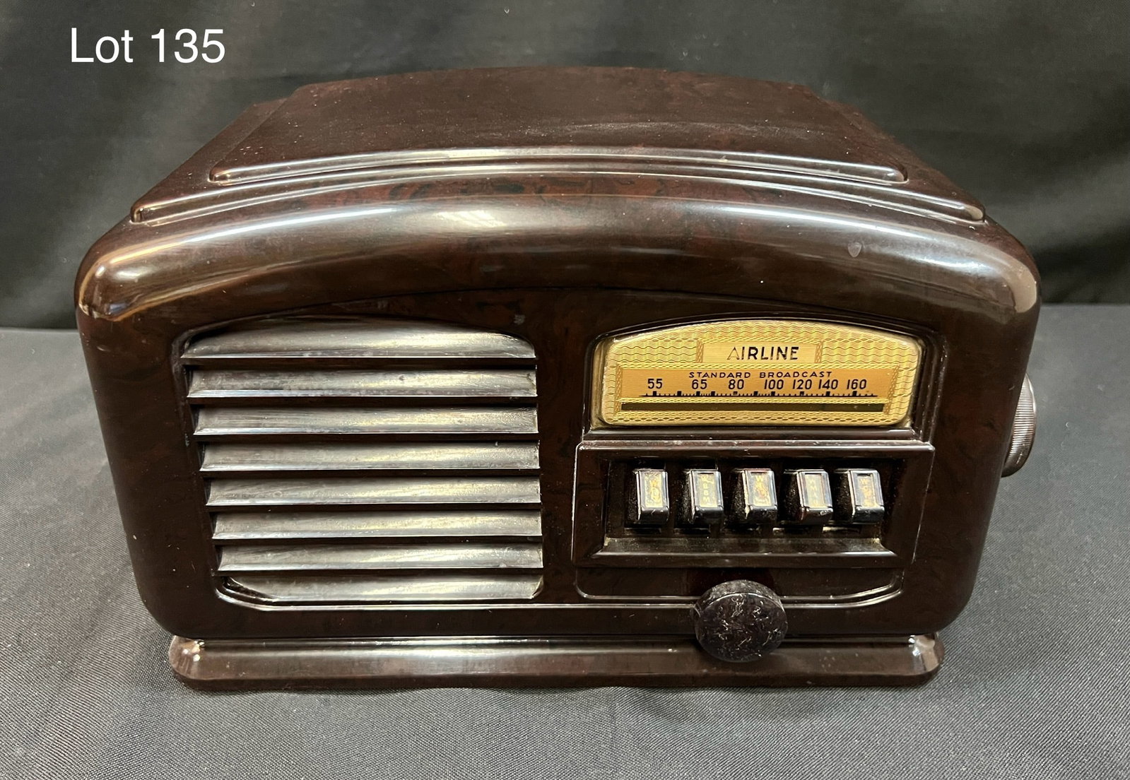 1940 Airline 04BR-513A Tube Radio: A 1940 Airline 04BR-513A plastic table tube radio. Art Deco design, right slide rule dial, 5 push buttons, left horizontal louvers, 2 knobs, BC.