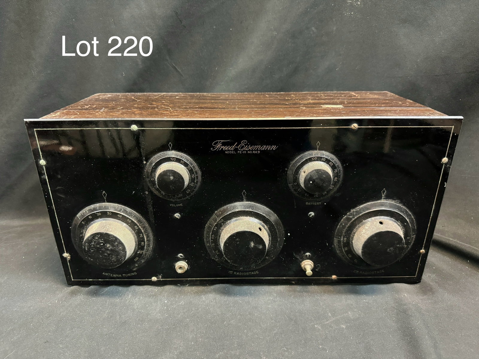 1924 Freed-Eisemann FE-15 Tube Casket Radio: A 1924 Freed-Eisemann model FE-15 tube casket radio. Rectangular wooden case, 5 dials, lift top, BC, 5 tubes.