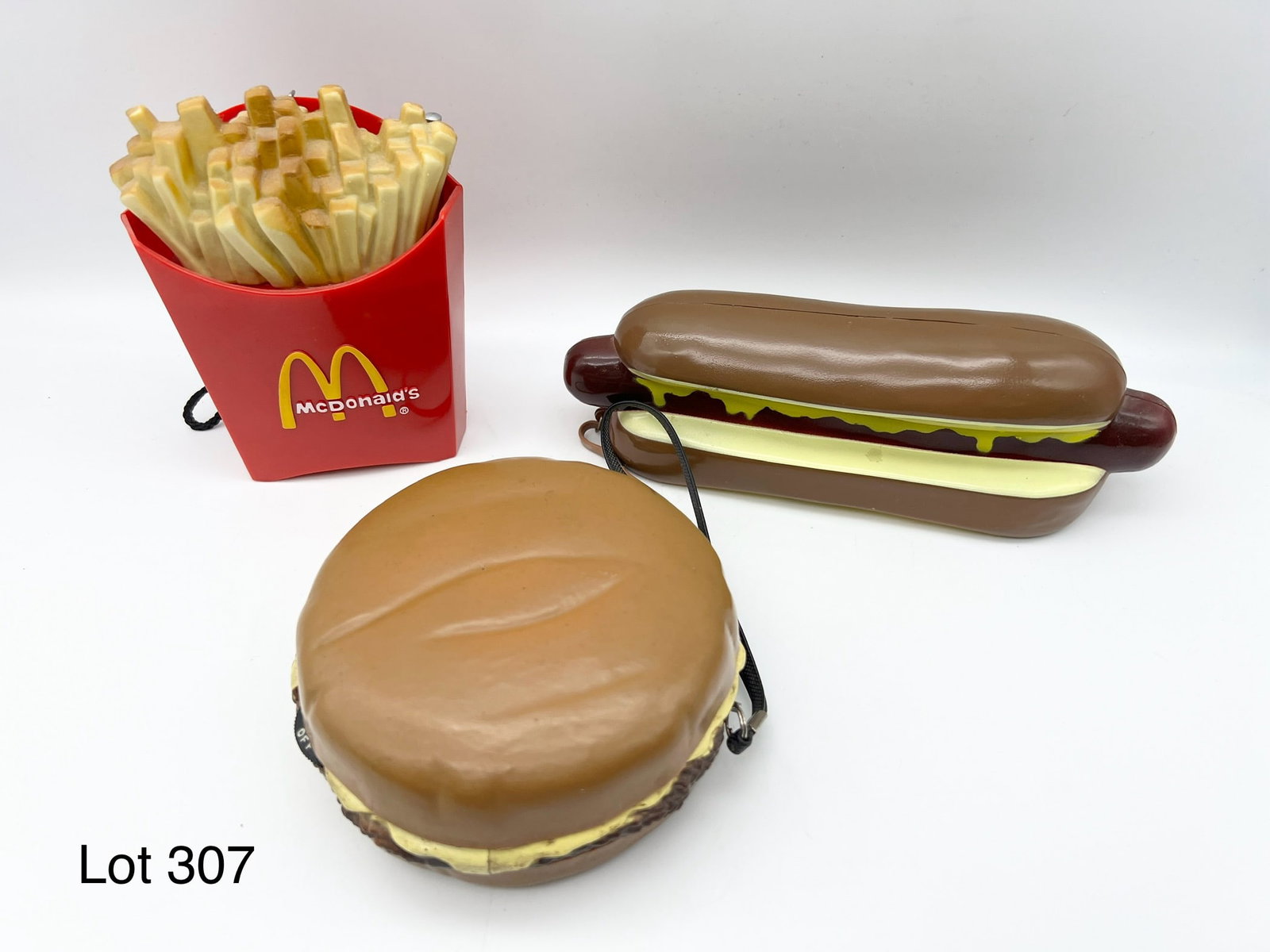 Trio of Novelty Transistor Radios: A group of three novelty transistor radios. Includes a cheeseburger, hot dog and McDonalds french fries.