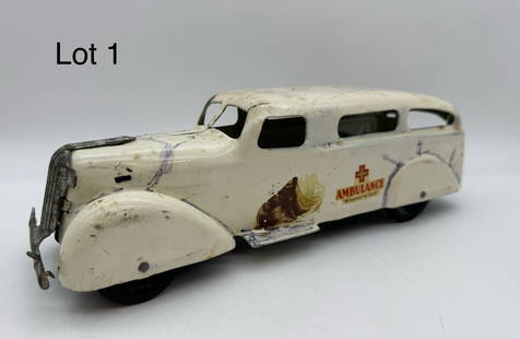 Vintage 1930's Wyandotte Pressed Steel Ambulance: A vintage 1930's Wyandotte pressed steel ambulance in white. Missing back door and grill flange, sticker residue, and top is defaced. Measures 11" x 3.5".
