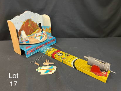 Coast Guard Shooting Gallery Board Game by Baldwin: Baldwin Manufacturing Co. Brooklyn NY 'Coast Guard In Action' shooting gallery game circa 1942. Tin/cardboard 29" long shooting gallery. Cardboard box folds up into position. Cardboard targets,
