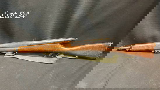Vintage Parris Kadet Toy Rifle: A vintage Parris Kadet toy rifle. Bolt action, wood stock, canvas strap. Measures 28" long. *note - wear with age