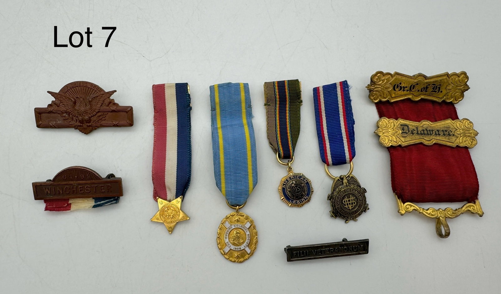 Mixed Bars and Medals Lot: A mixed lot of pins, bars, and medals including G.A.R., Sons of Veterans, and more. Two are gold filled.
