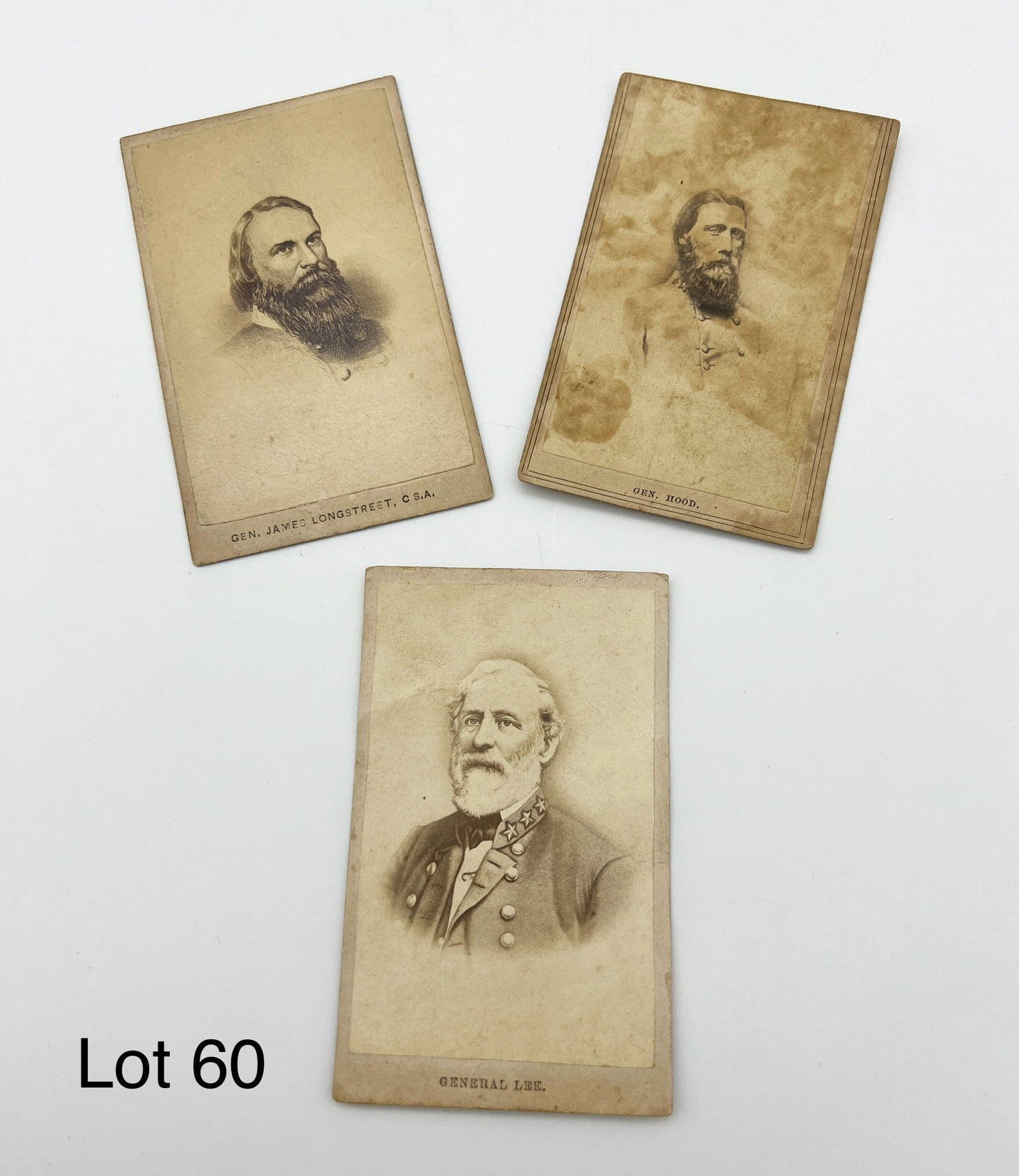 Three Carte de Visite Of Confederate Officers Inc. General Lee: This lot is 3 Confederate CDV's that includes General Lee, Longstreet, and Hood. All have slight foxing and discoloration. Each measures 4 x 2.5.