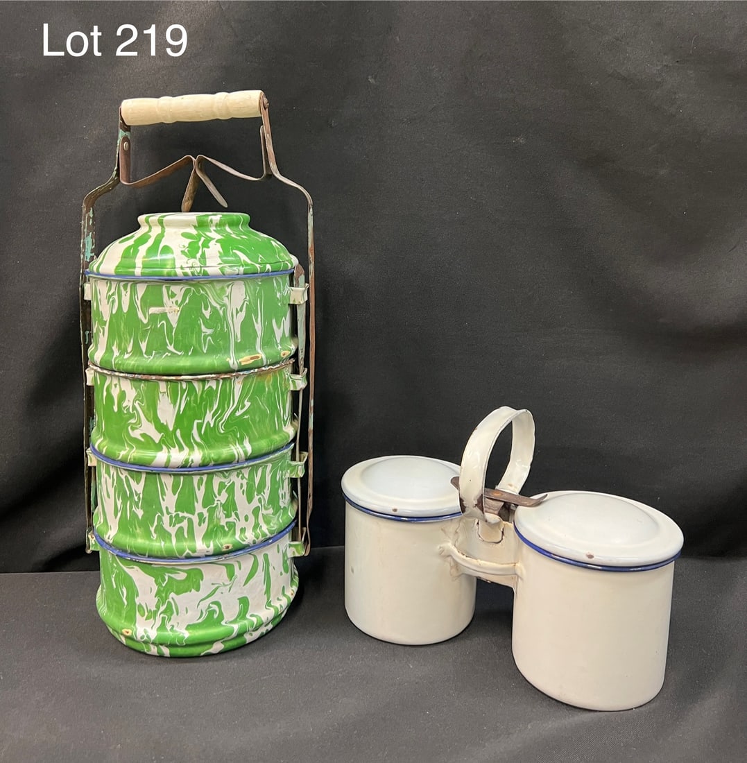 Pair of Vintage Enameled Food Containers: Duo of mid 20th century enameled food containers. Includes a green and white swirl enamelware stacking food storage container with metal handle/carrier and a white enameled double mug storage with han