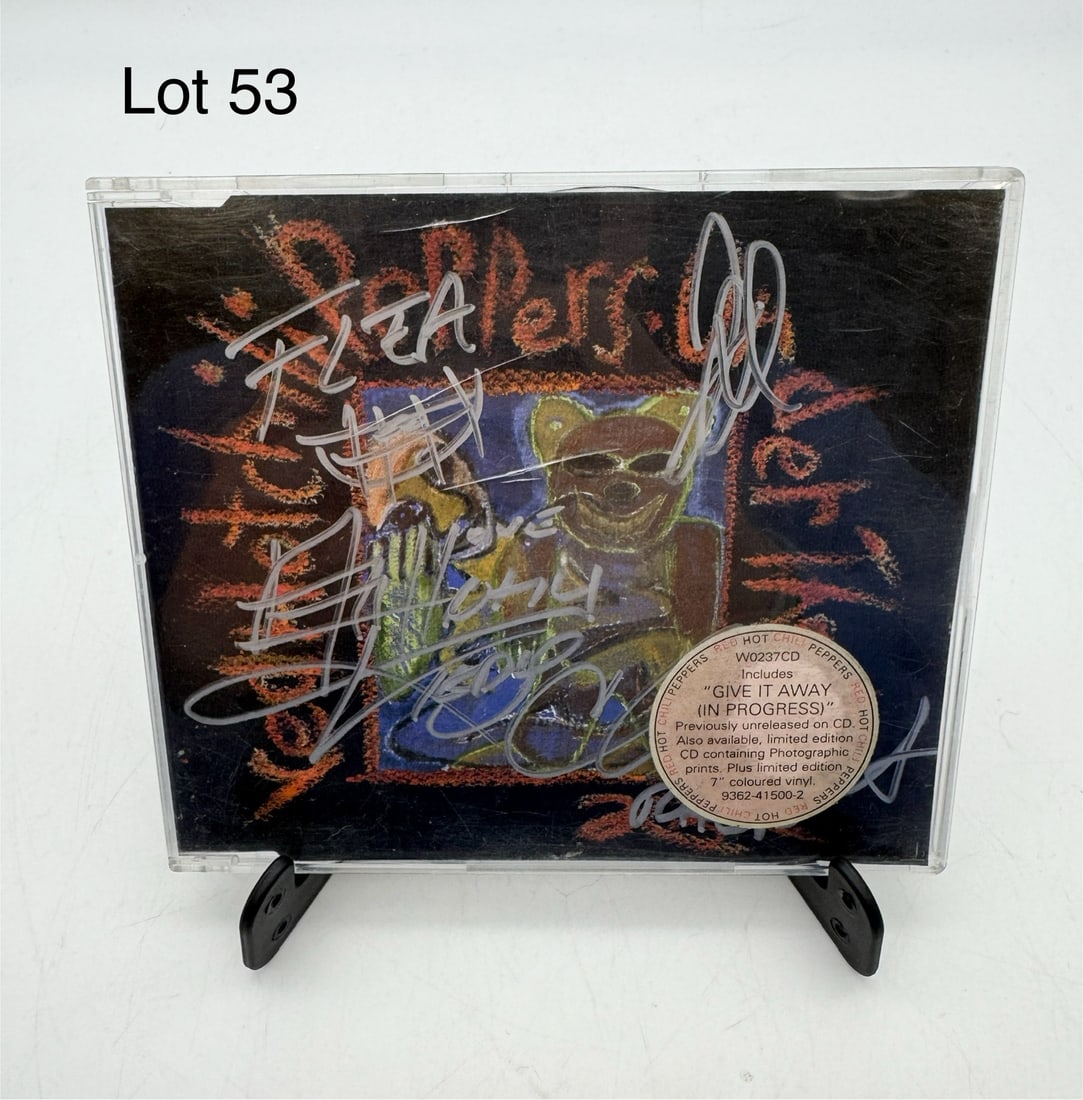 Signed Red Hot Chili Peppers 'Under the Bridge' CD: A signed 1994 Red Hot Chili Peppers 'Under the Bridge' 4-track CD. Includes signatures from Flea, Anthony Kiedis, John Frusciante, and Chad Smith.
