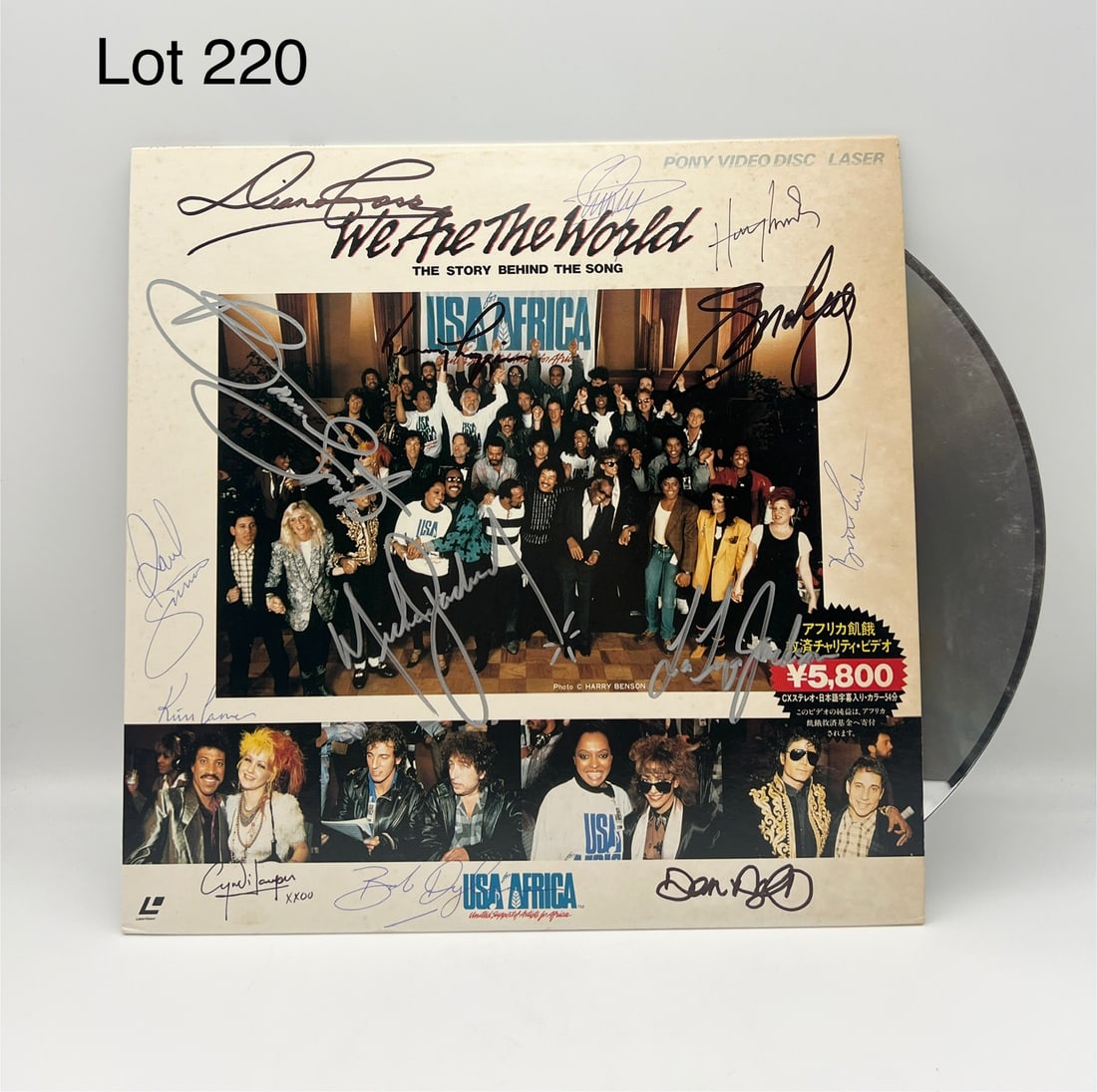 Signed 'We Are The World: The Story Behind The Song' Laserdisc: A signed 'We Are The World: The Story Behind The Song' Japanese laserdisc. Signatures from musicians/celebrities involved include Michael Jackson, Diana Ross, Cyndi Lauper, LaToya Jackson, Bob Dylan,