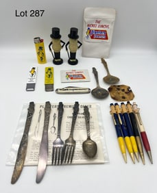 A mixed selection of Planters Mr Peanut Collectibles Including Mechanical Pencils and Silver Plate