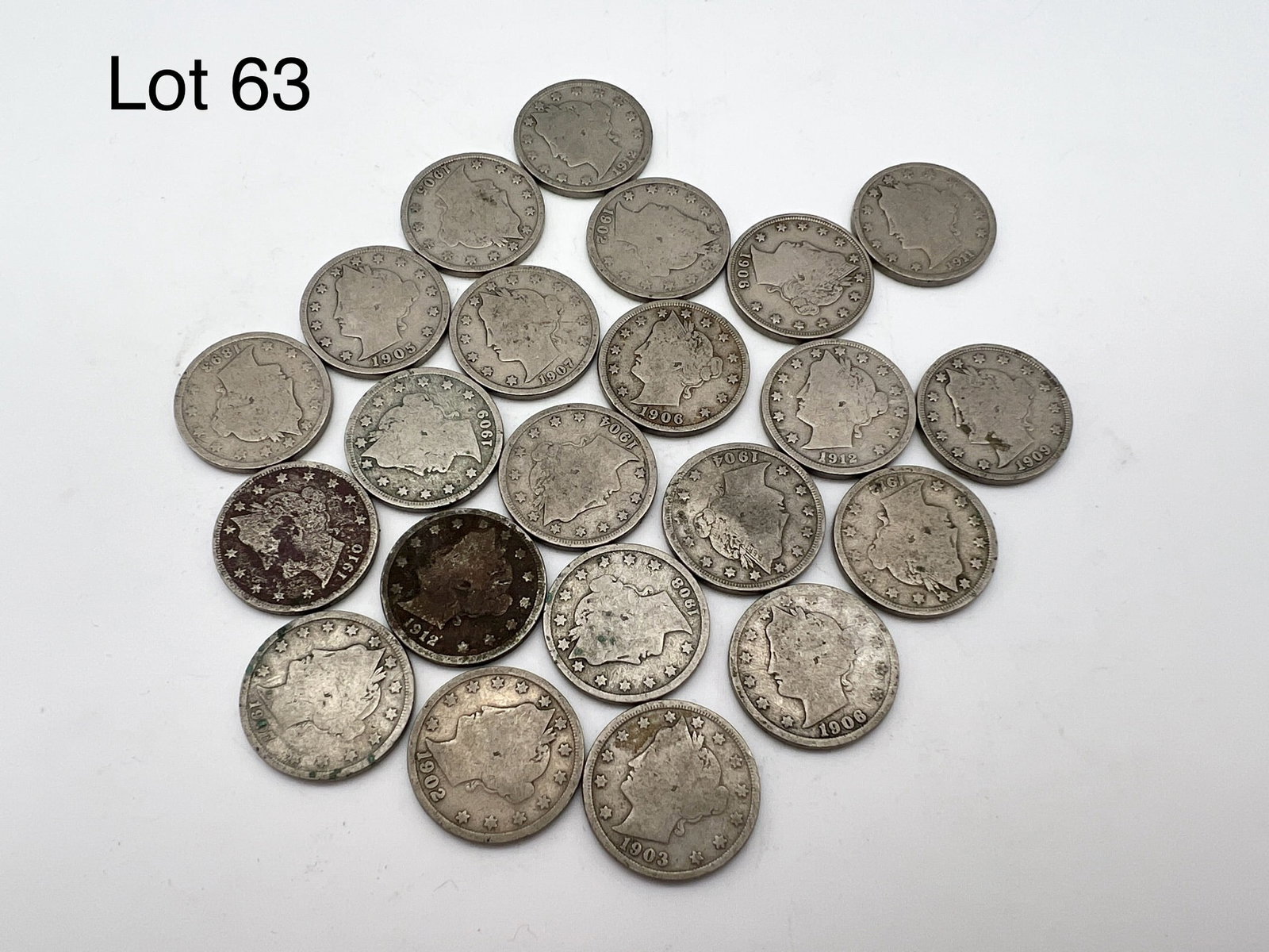 Lot of 1902-1912 Liberty Head Nickels: A lot of U.S Liberty Head nickels noted from years 1902-1912 showing $1.10 in face value. Mixed conditions.
