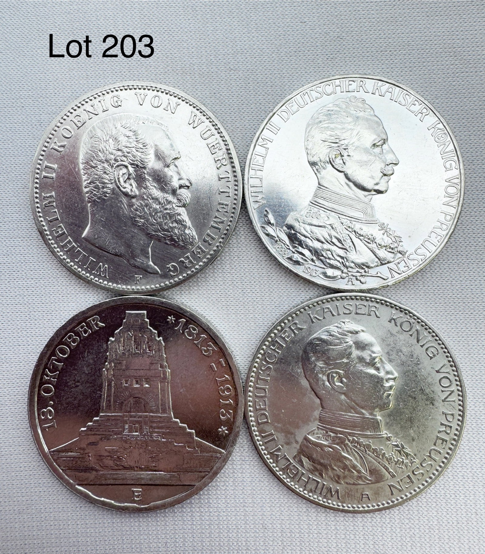 A Lot of 4 Drei (3) Marks Deutsches Reich Silver Coins: A lot of 4 XF Drei (3) Marks coins, 1918-A, 1912-F, 1913-E, 1914-A. 90 % silver.