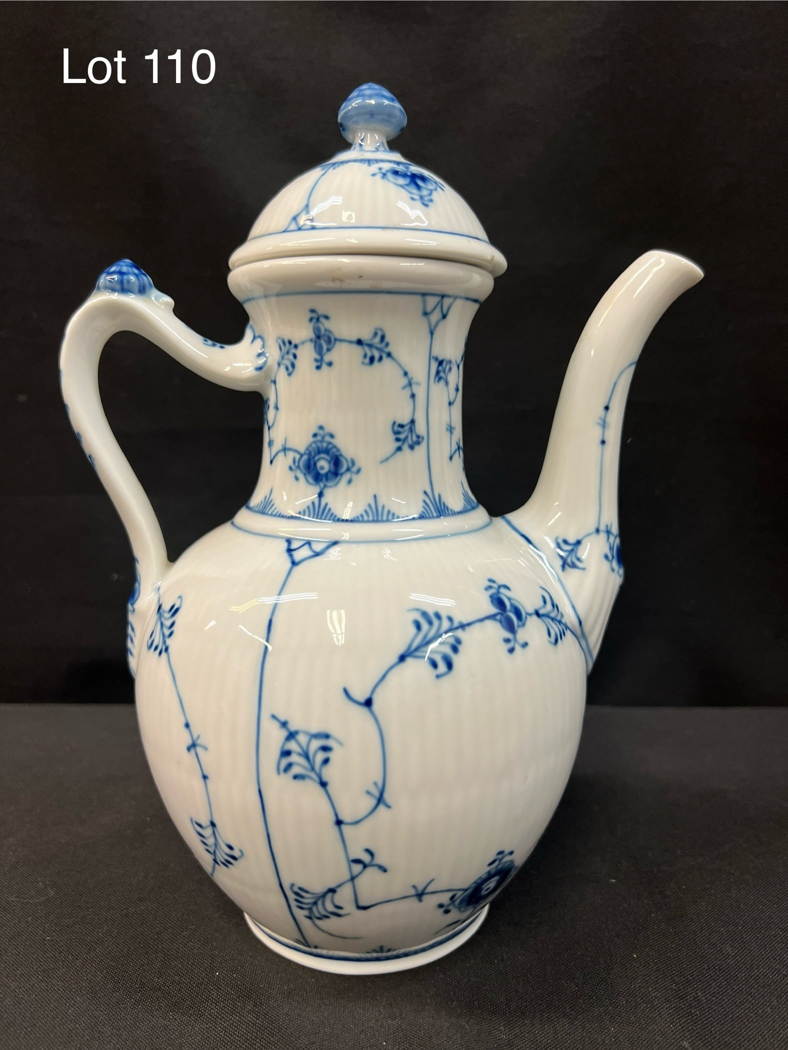 Royal Copenhagen Blue and White Porcelain Tea / Coffee Pot: A Royal Copenhagen blue and white lace porcelain tea/coffee pot with lid. Underside bares makers mark and 1/48. 9 1/2" tall.