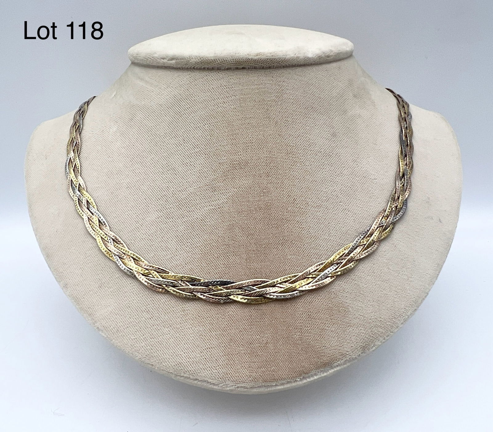 Sterling Silver Vermeil Multi Toned Braided Necklace: A sterling silver vermeil tri colored braided necklace.