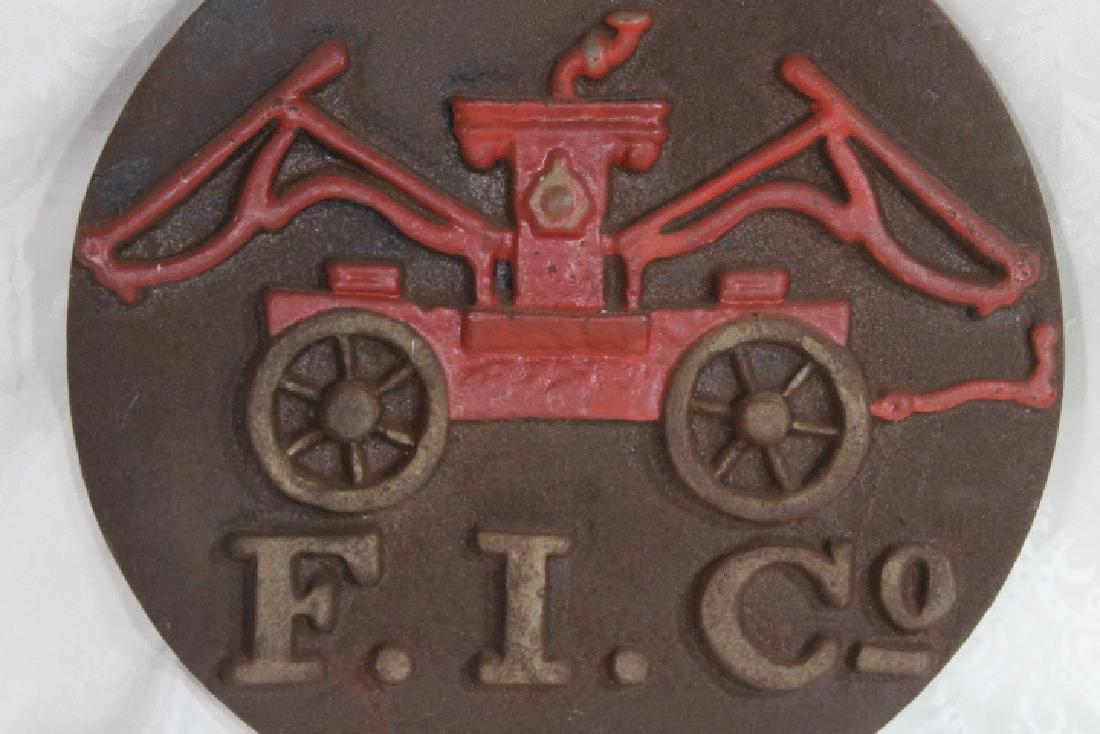 Cast Iron Hanging Sign: Firemans Insurance Company, cast iron sign, size is 13" x 11 1/2" with hanger