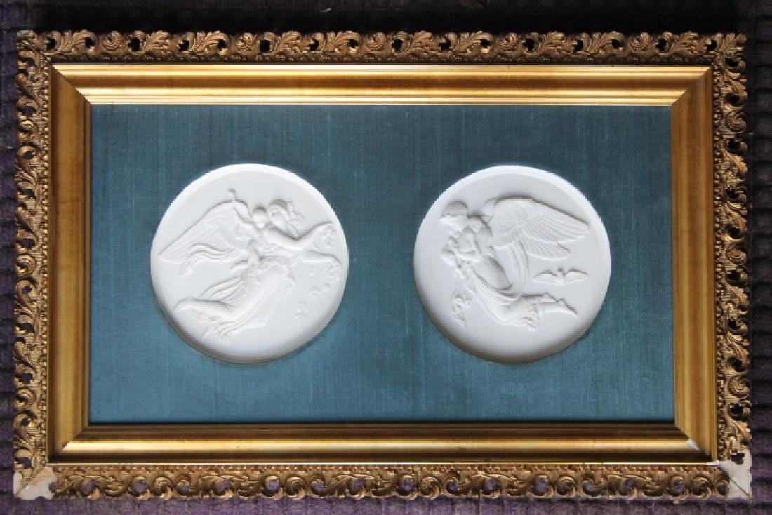 Two Bing & Grondahl Angel Plaques: Two circular Bing & Grondahl 5 1/2" diameter plaques framed White porcelain, day and night angels.